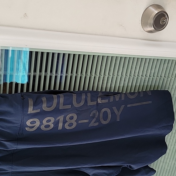 Lululemon T.H.E. Short 20 year Collection 9 in color is True Navy - Picture 5 of 11